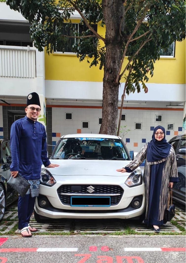 Hazlizam and his family with a Tribecar