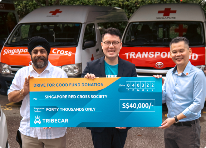 Tribecar presenting a S$40,000 cheque to Singapore Red Cross